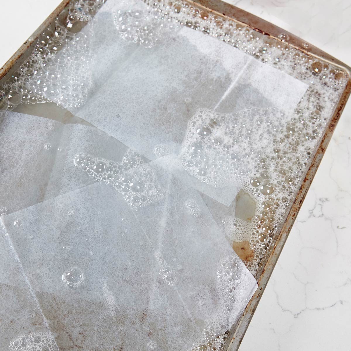 cleaning burnt pan with dryer sheets