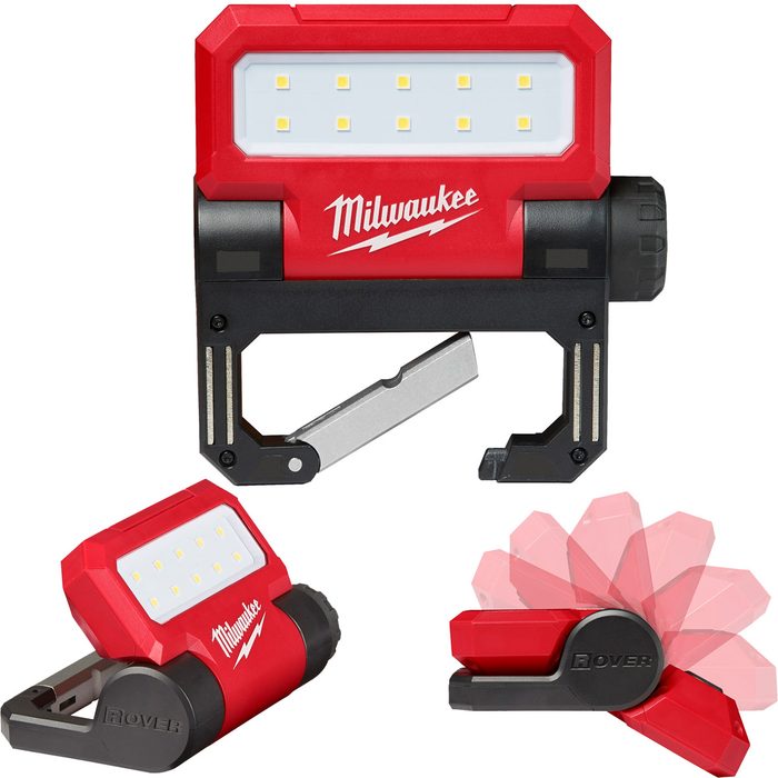 A red LED work light is positioned, illuminating its surroundings. Its adjustable base allows for flexible angling, suitable for various lighting needs.