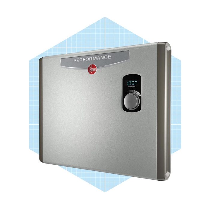 A silver water heater displays a digital temperature reading of 105°F, mounted on a light blue grid-patterned background, suggesting a modern, efficient design.