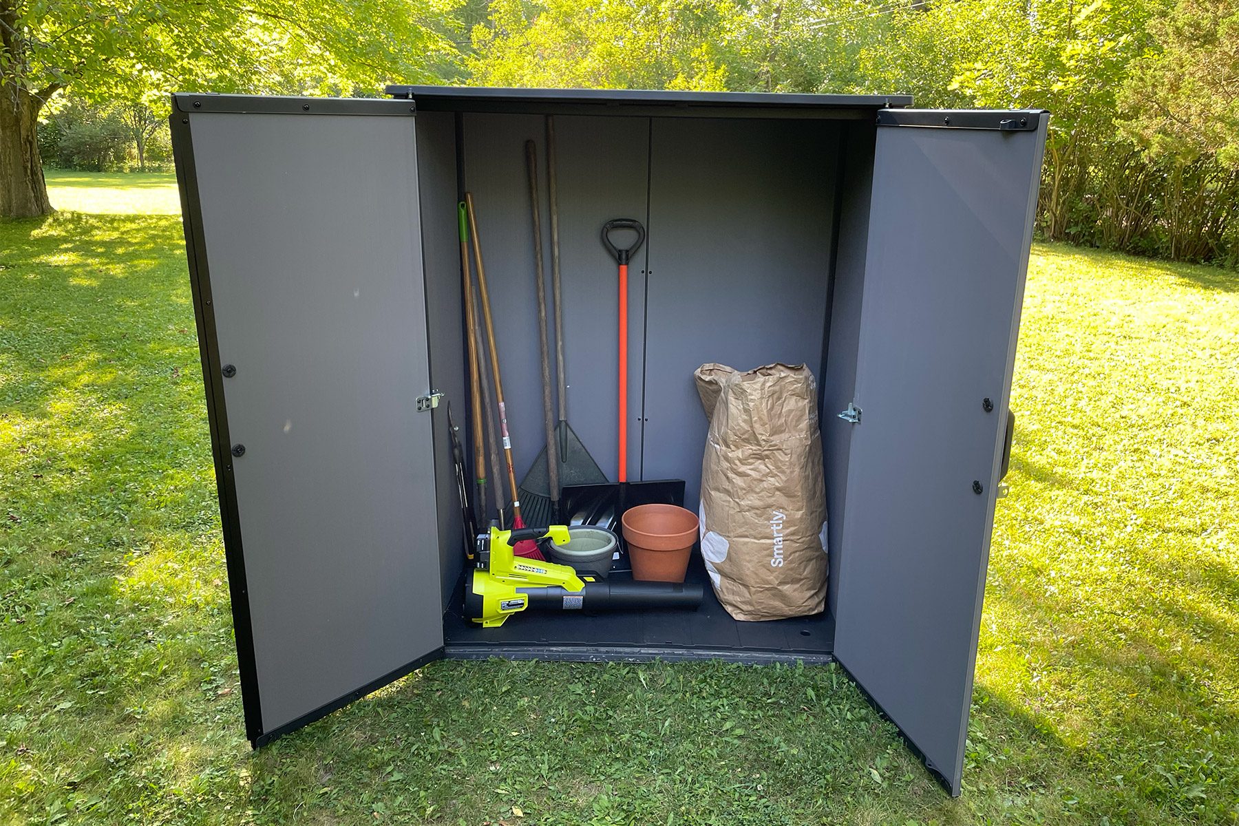 Keter Shed opened up with tools in it