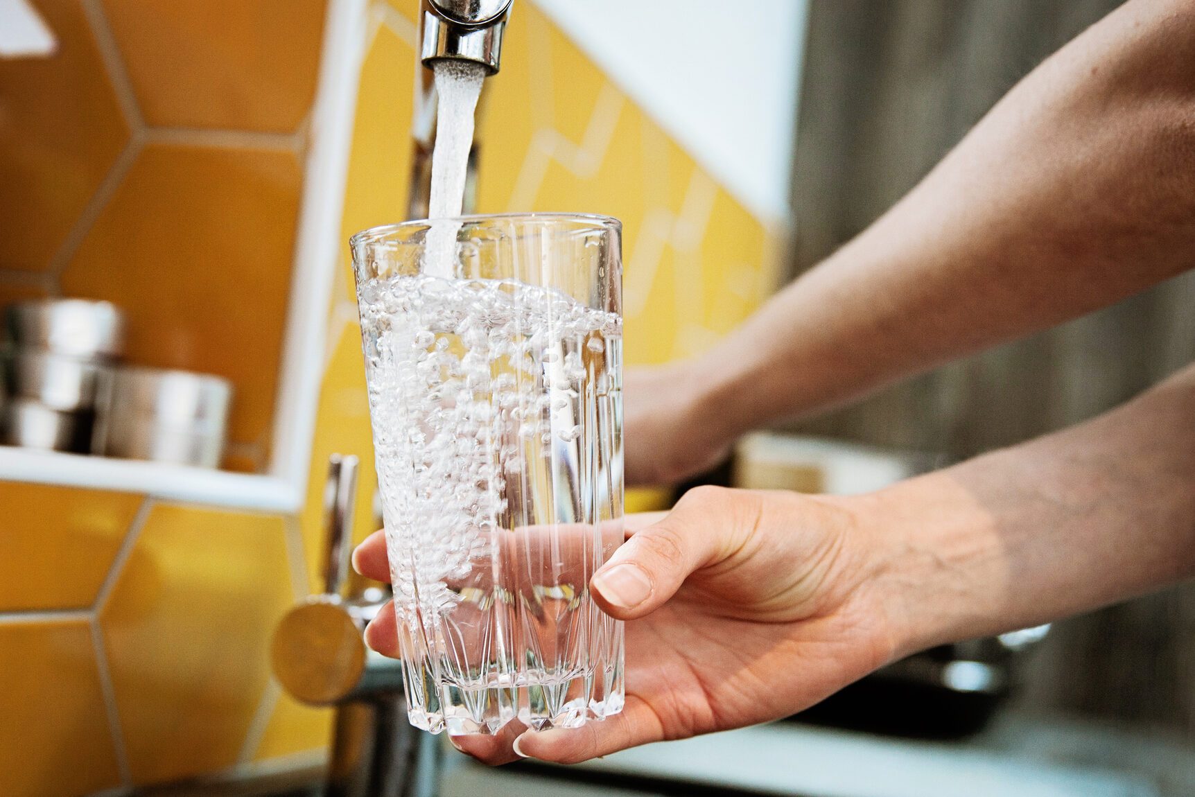 If You See White Flakes In Your Water, Here’s What It Means