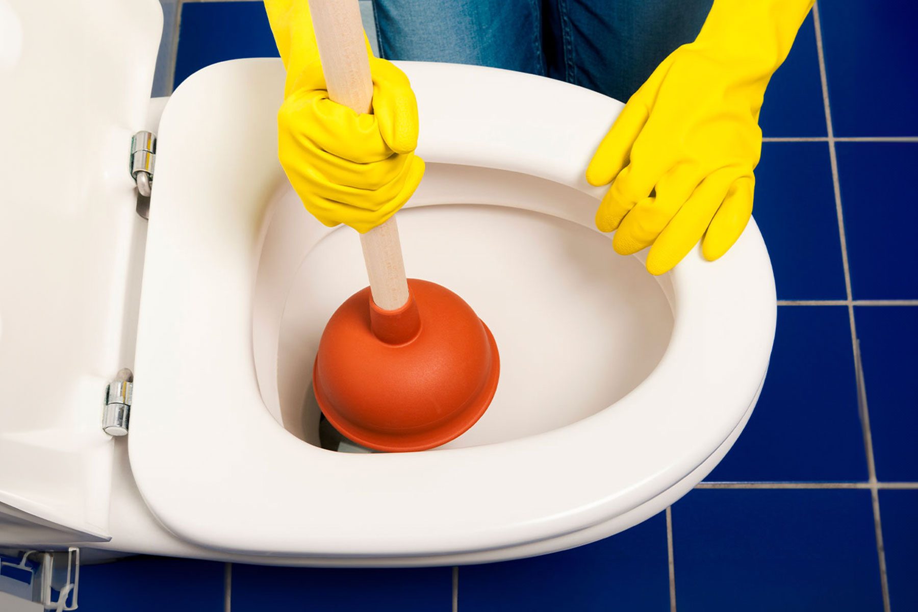 How To Plunge and Unclog a Toilet the Right Way, According to Experts