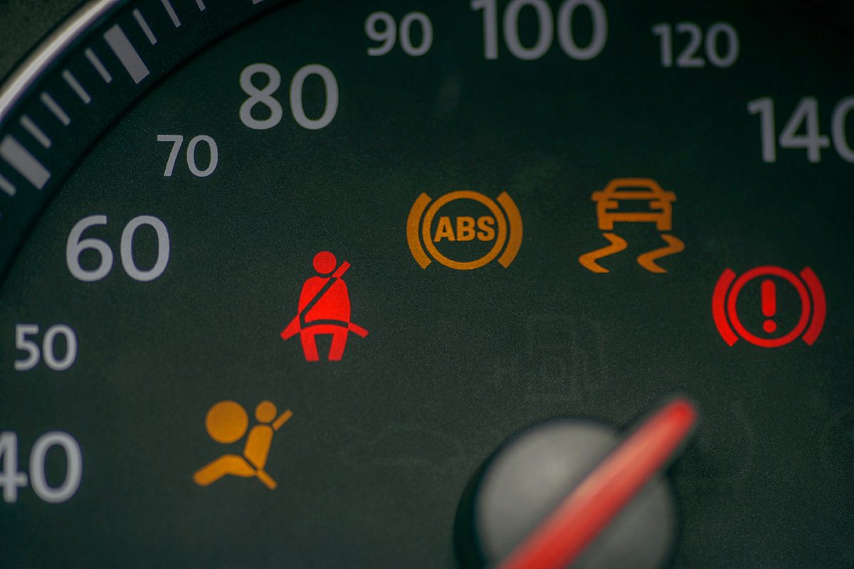 Car speedometer with dashboard symbols